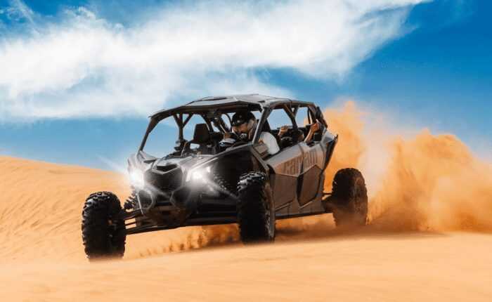 Dune Buggy Dubai Tours of 4 Seater Family Can-am Maverick X3 in Desert